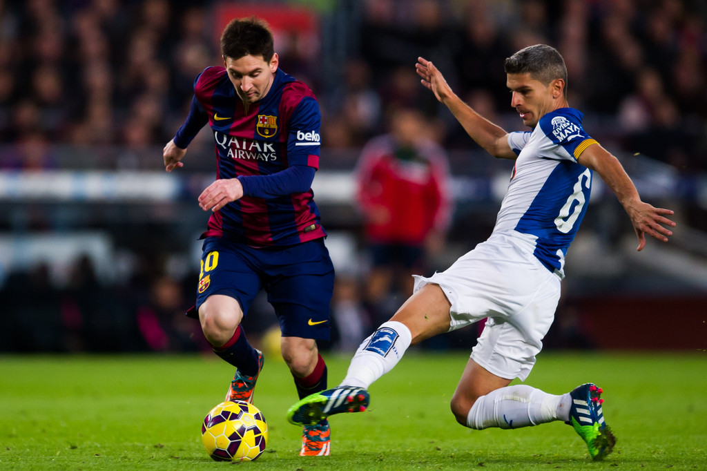 ثلاثية ميسي تقود انتفاضة برشلونة أمام اسبانيول