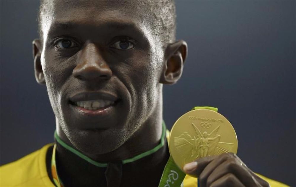 اللجنة الأولمبية الدولية تجرد بولت من إحدى ميدالياته الذهبية