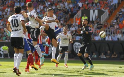 بطولة اسبانيا: فالنسيا يؤكد جديته في المنافسة بالحاقه الهزيمة الاولى باتلتيكو