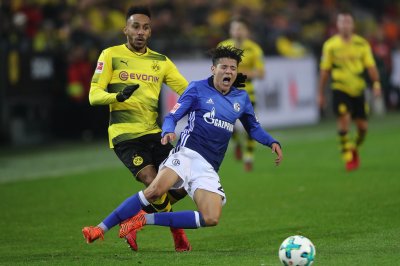 بطولة ألمانيا: شالك المذهل يعود ويتعادل 4-4 مع دورتموند