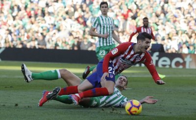 فضال يوقف موراطا وغريزمان ويفرح برشلونة