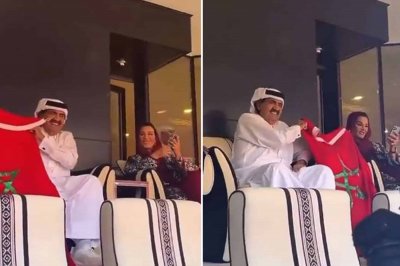 الشيخة موزة والشيخ حمد ساندا الأسود بالعلم المغربي